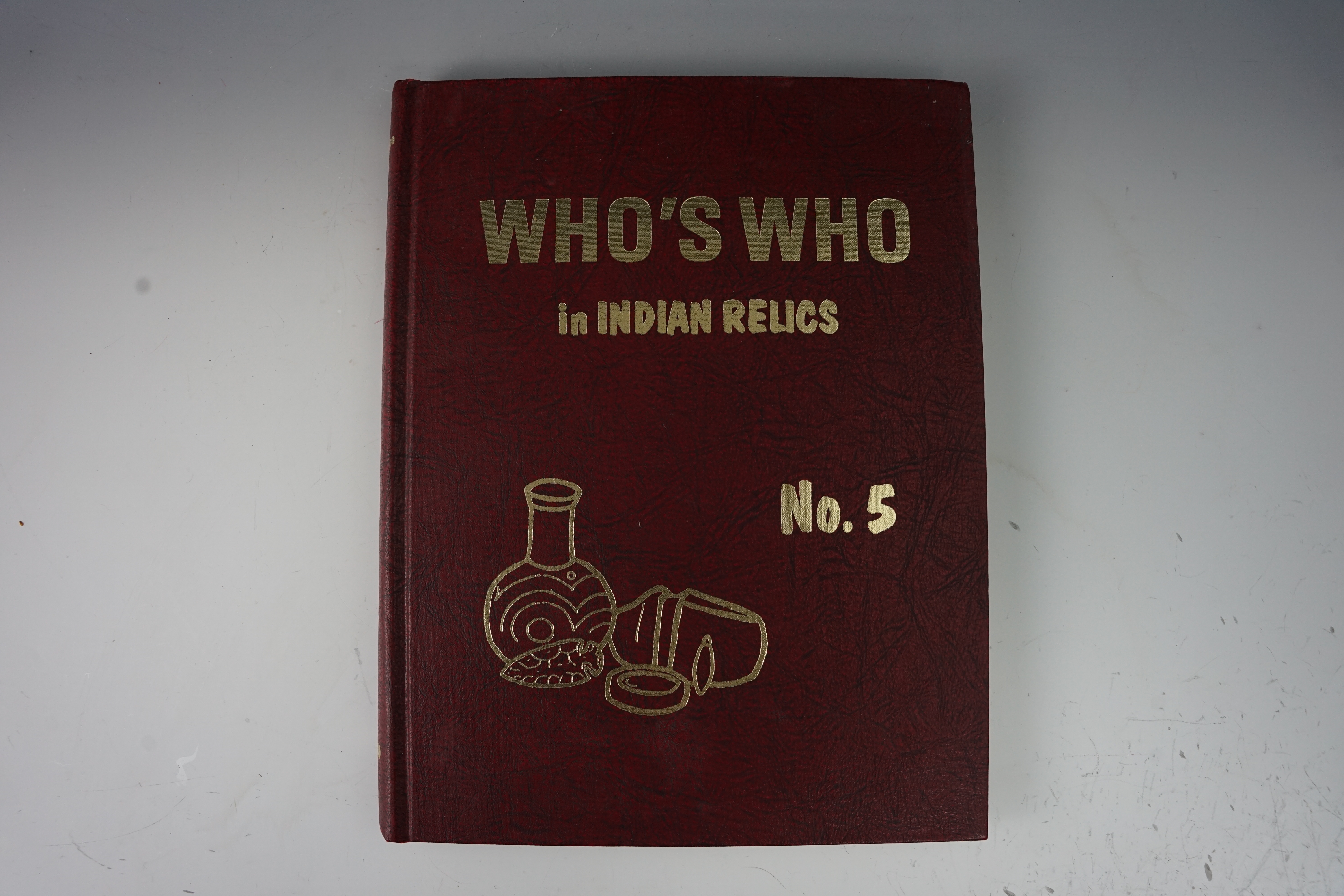 Hardbound book "Who's Who" #5 in good condition.