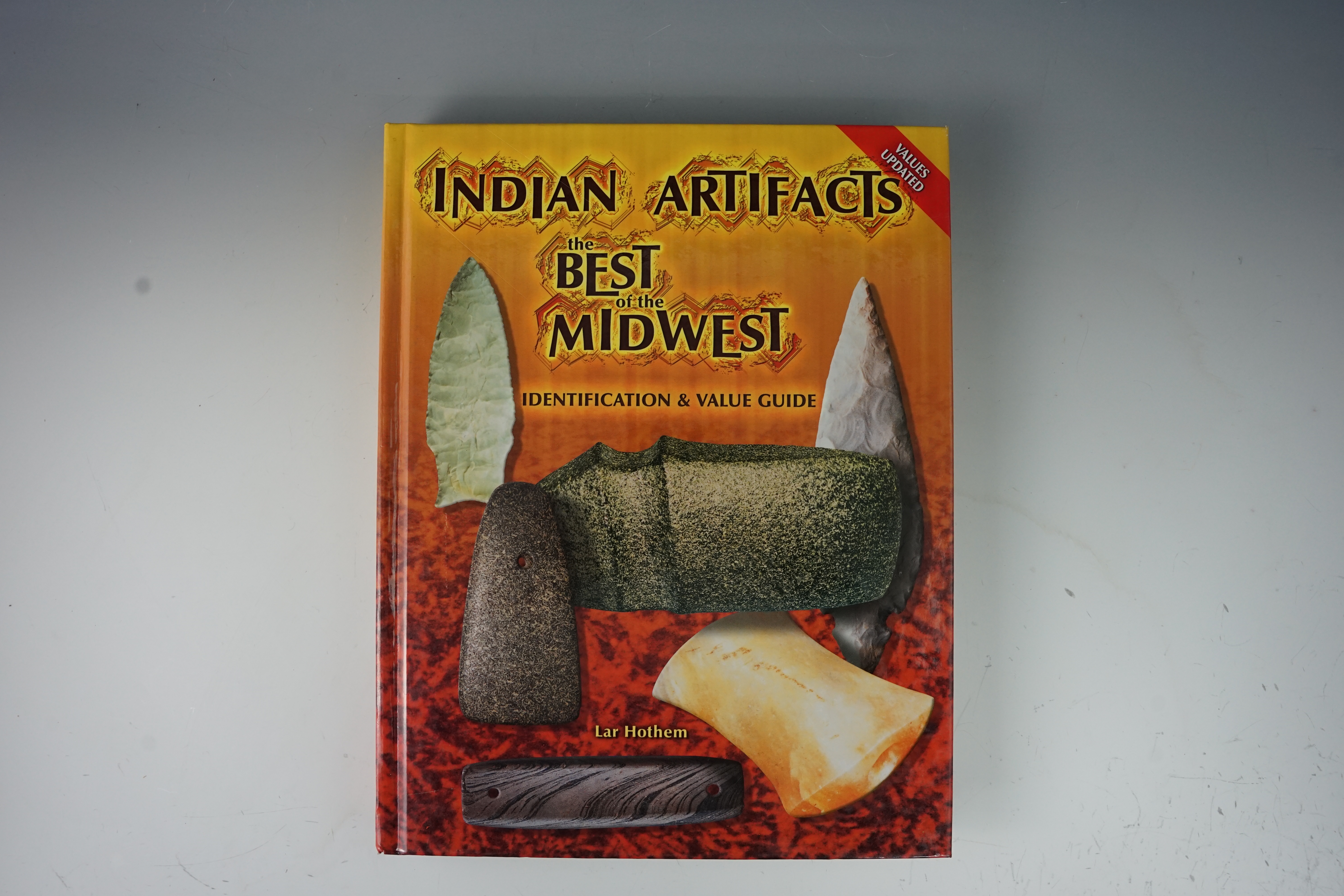 Hardcover book in new condition "Indian Artifacts the Best of the Midwest" by Lar Hothem.