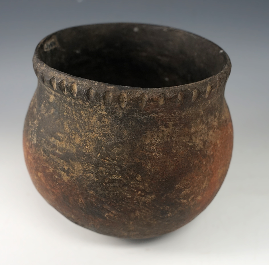 4 1/2" wide x 4 3/4" tall Owasco pottery vessel that is nicely restored. Coopers Plains, New York.