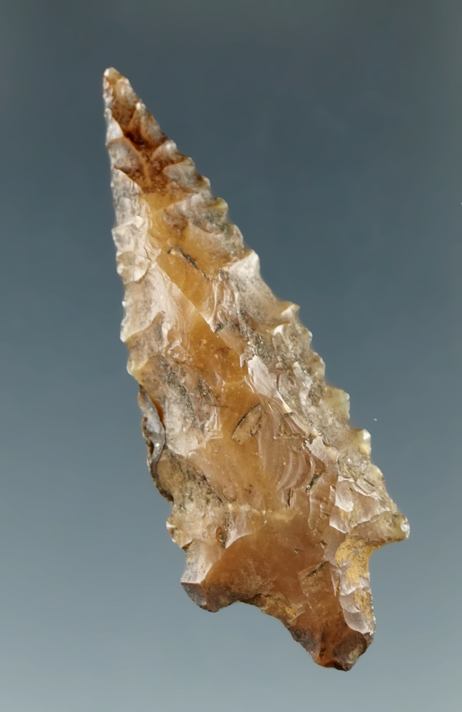 1 1/2" Rabbit Island, Serrated, made from Brown Jasper, found near the Columbia River.