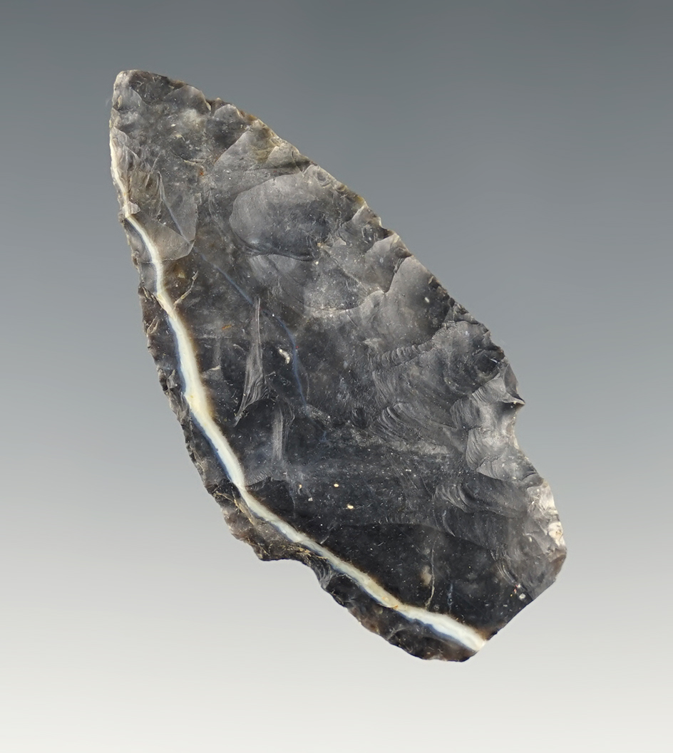 2 5/16" Ohio Stemmed point. Made from Coshocton flint with a nice Lightening Line.