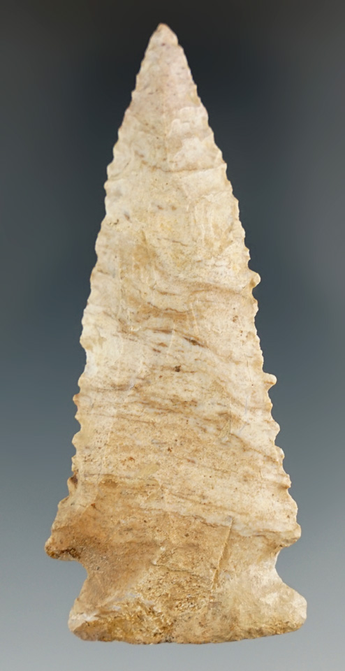 3 1/4" Serrated Kirk found in Tennessee with restoration to one half of base and one ear.