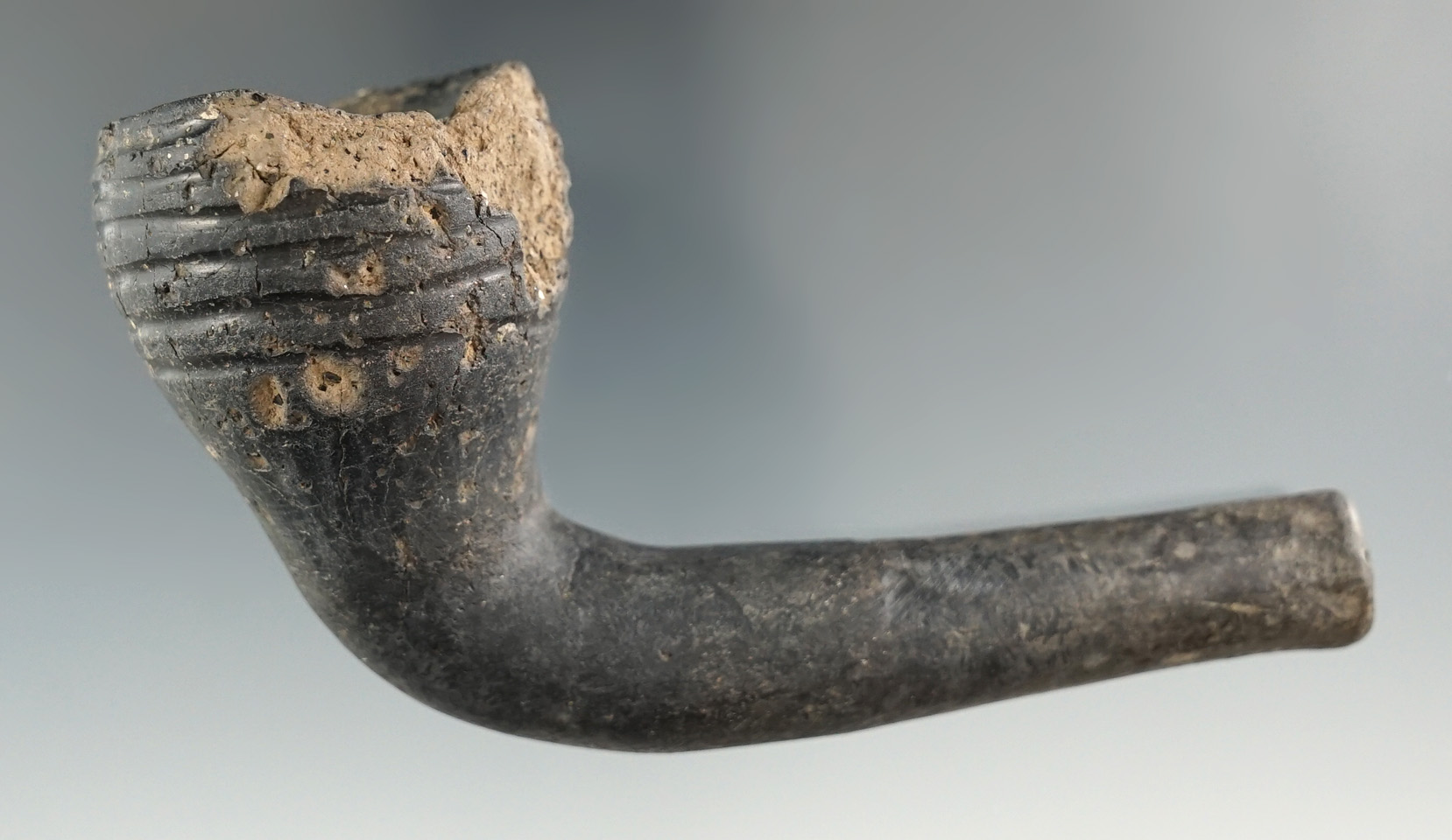 4" by 2 1/4" tall Iroquois Ring Bowl Pipe - some restoration to elbow and stem and damage to the bow