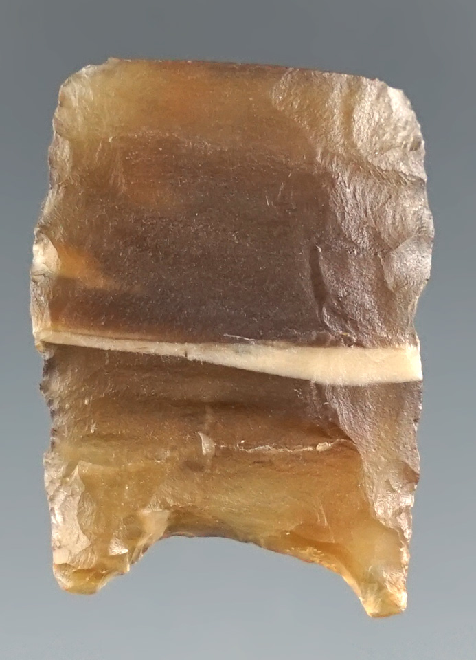 1 1/16" Paleo Folsom Base found in Llano Co., Texas.  Rogers COA.