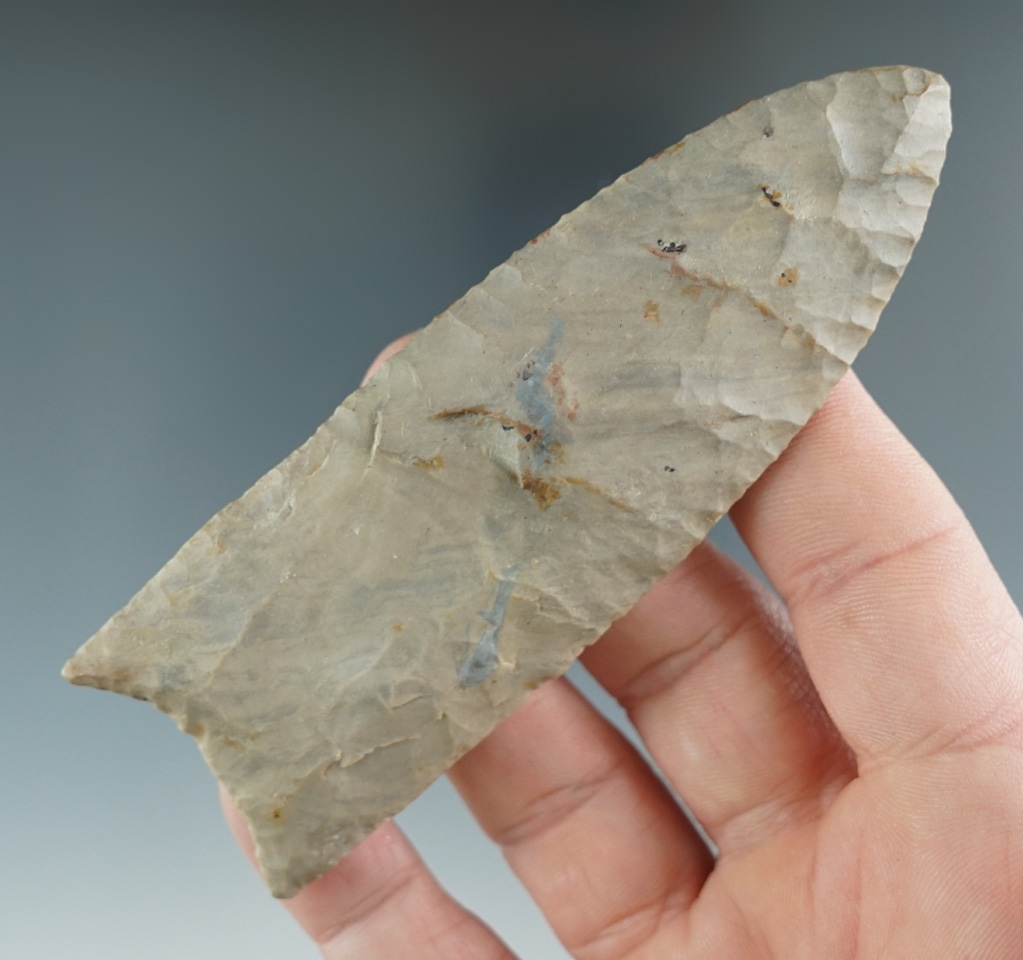 Heavily restored 4" Clovis made from Dover Chert, found in Hardin Co., Tennessee.