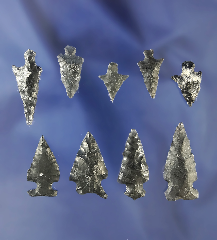 Set of nine assorted obsidian arrowheads, largest is 1 3/16".
