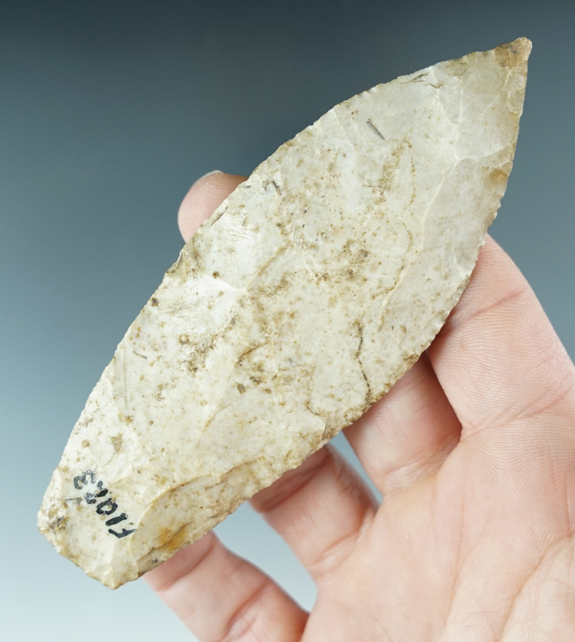 4 7/16" Heavily patinated Agate Basin with a needle tip, found in Pike Co., Illinois.