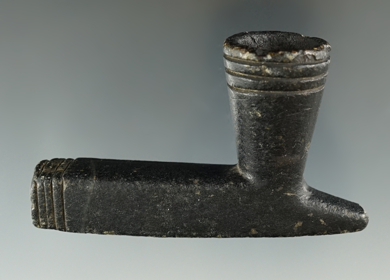 3 3/8" x 1 15/16" Black Steatite Historic Era Elbow Pipe. Beautiful incising on bowl and stem.