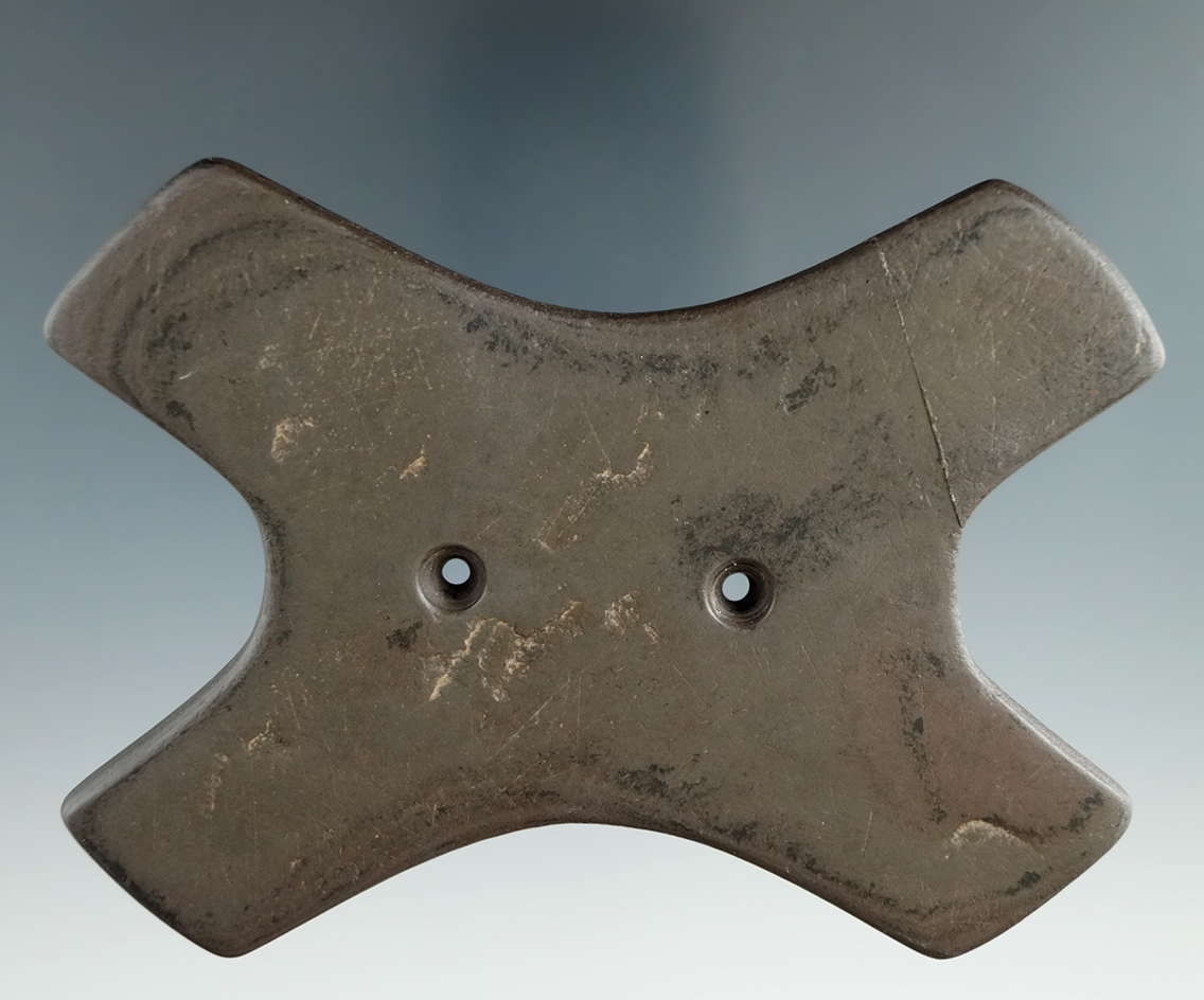 4 3/8" Hopewell Reel Gorget with one prong broken and glued. Found in Pike Co., Ohio.