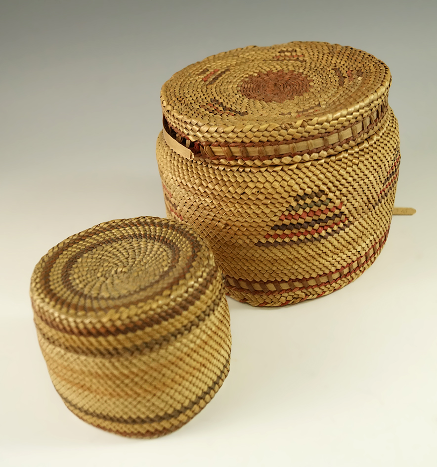 Pair of vintage Lidded Baskets from the northwest coast. Largest is 3 3/4" diameter.