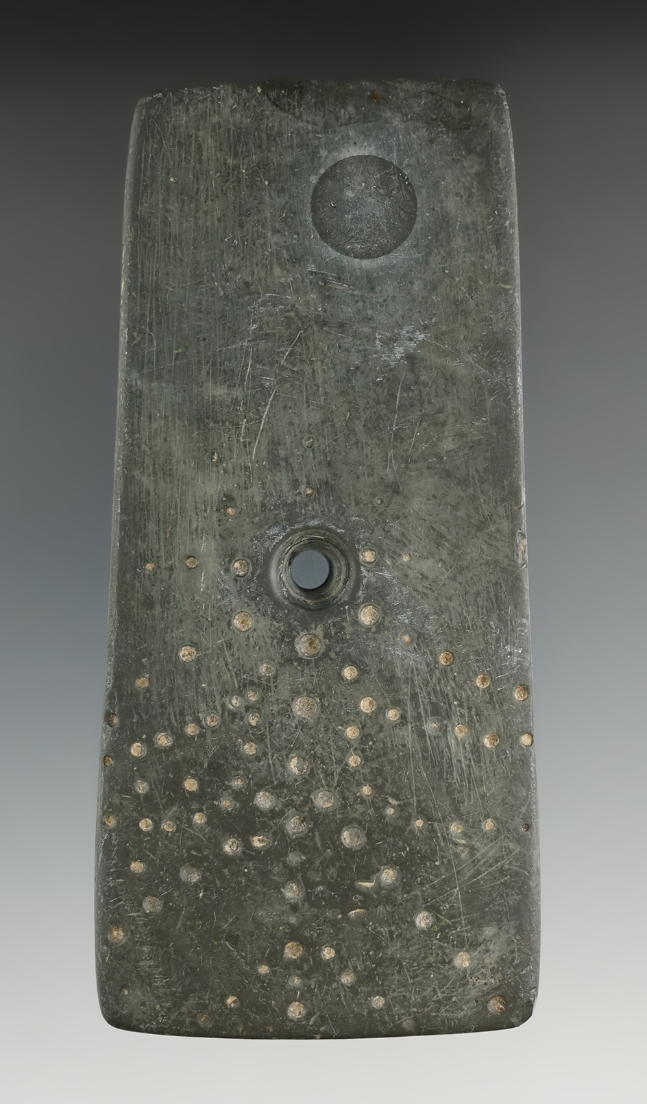 4 5/8" Adena Trapezoidal Pendant with 193 punctate marks, found in Darke Co., Ohio.