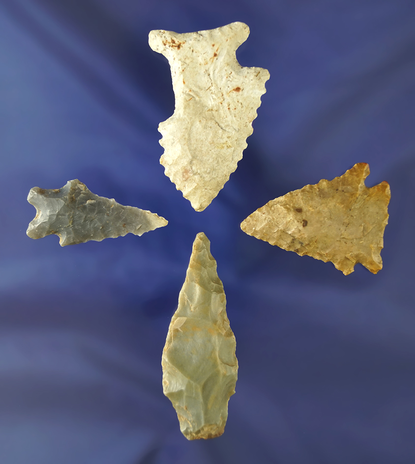 Set of four assorted arrowheads found in Kentucky. Largest is 1 7/8". One is uniquely salvaged.