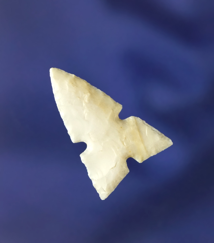 Excellent style on this 1 1/16" well flaked Notched  Triangle found in Southwest U. S.