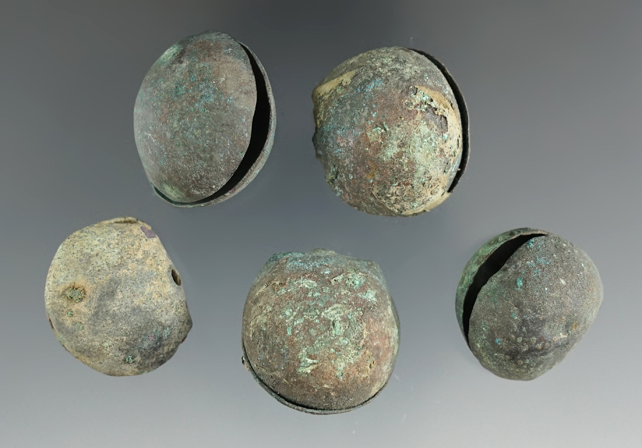 Set of five Moche culture pre-Columbian copper bells found in Peru.