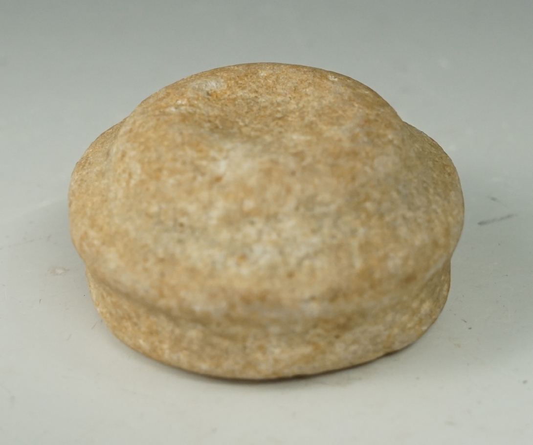 Well styled 2 1/16" diameter Neolithic disc that is well patinated found in the Western Sahara deser