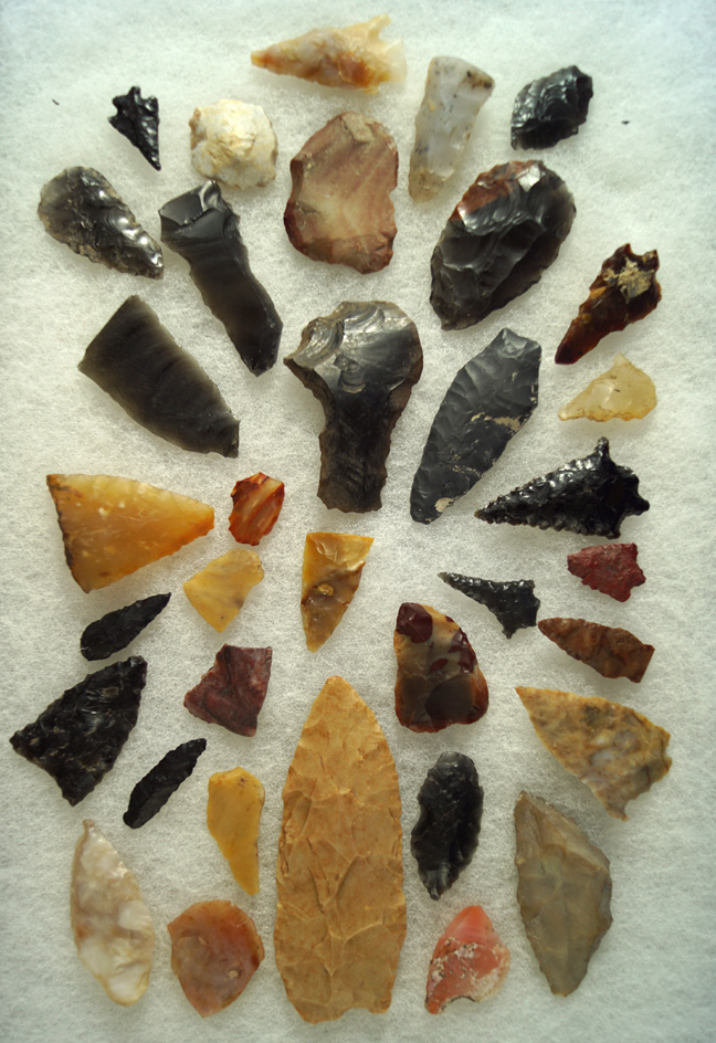 Large group of assorted flaked projectile points and knives found in the western U.S.