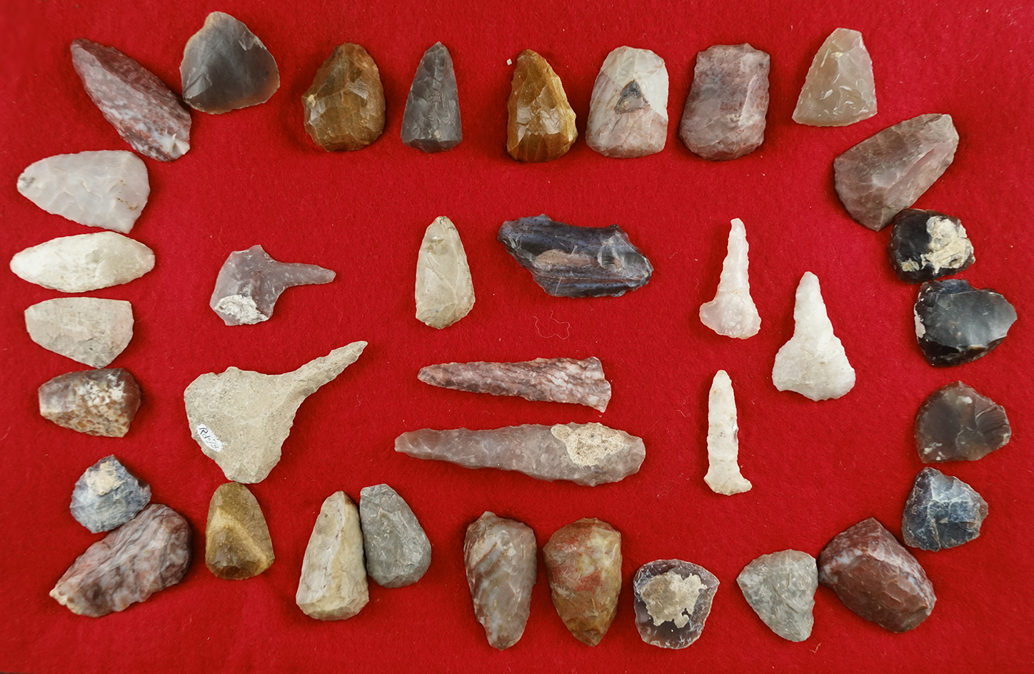 Large group of Plains Region tools including drills and scrapers. Largest is 2 11/16".