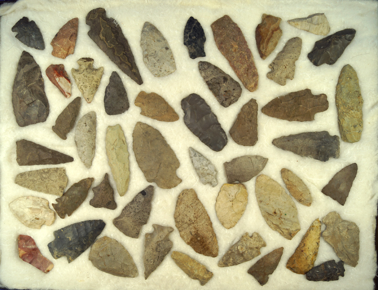 Very large group of assorted arrowheads and knives, largest is 3 3/8". Ex. Phil Waigel collection.