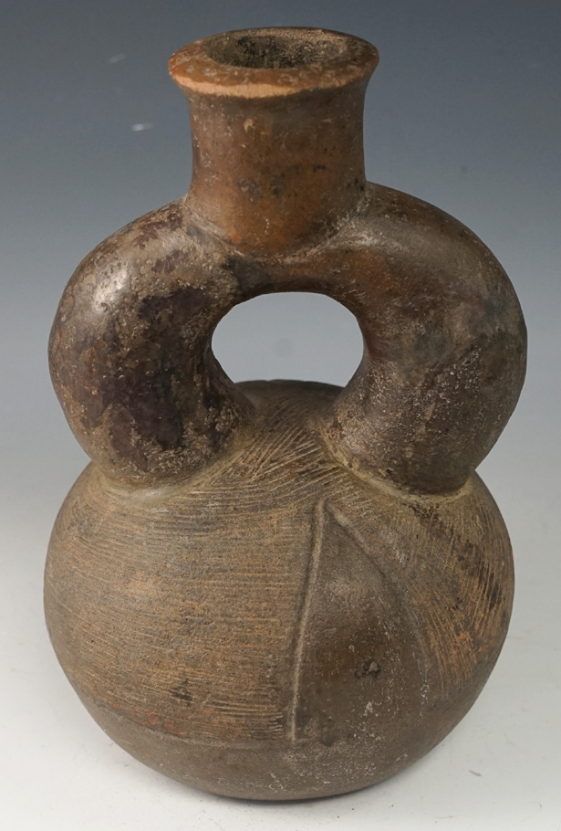 8" Tall well styled Chavin pottery vessel in very nice condition.