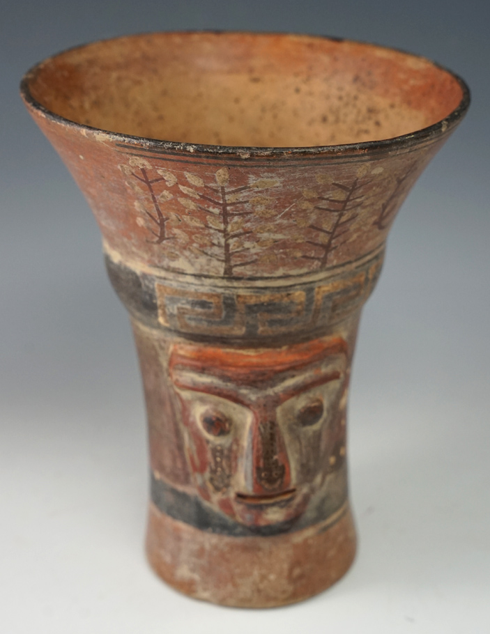 Excellent style and artwork on this 6 7/8" Tall Inca/Tiahuanaco Pottery Kero.Excellent condition.