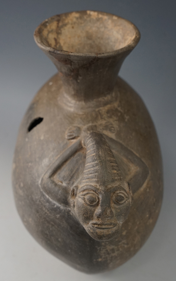 Large 9 3/4" long x 7 1/4" Tall very rare prisoner effigy Chimu culture pottery vessel.