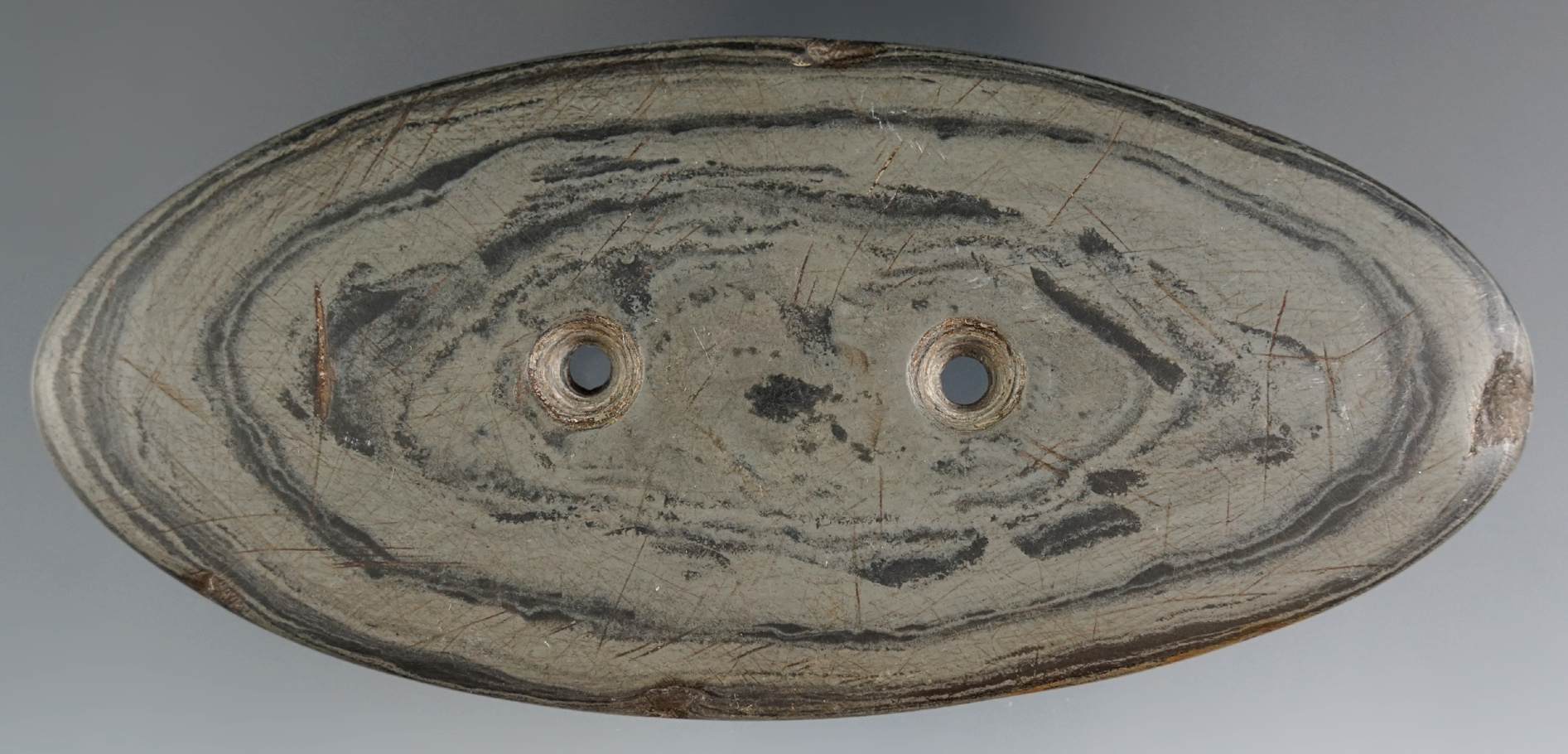5 7/16" Glacial Kame Oval Gorget made from Banded Slate, found in Knox Co., Ohio.