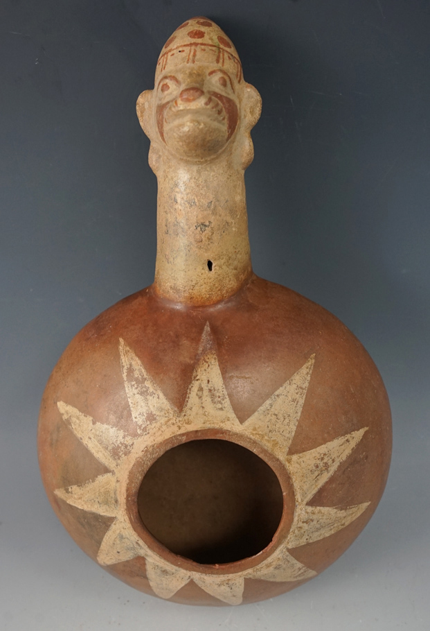 11 1/4" "Corn popper style" Moche IV pottery vessel with excellent paint design found in Peru.