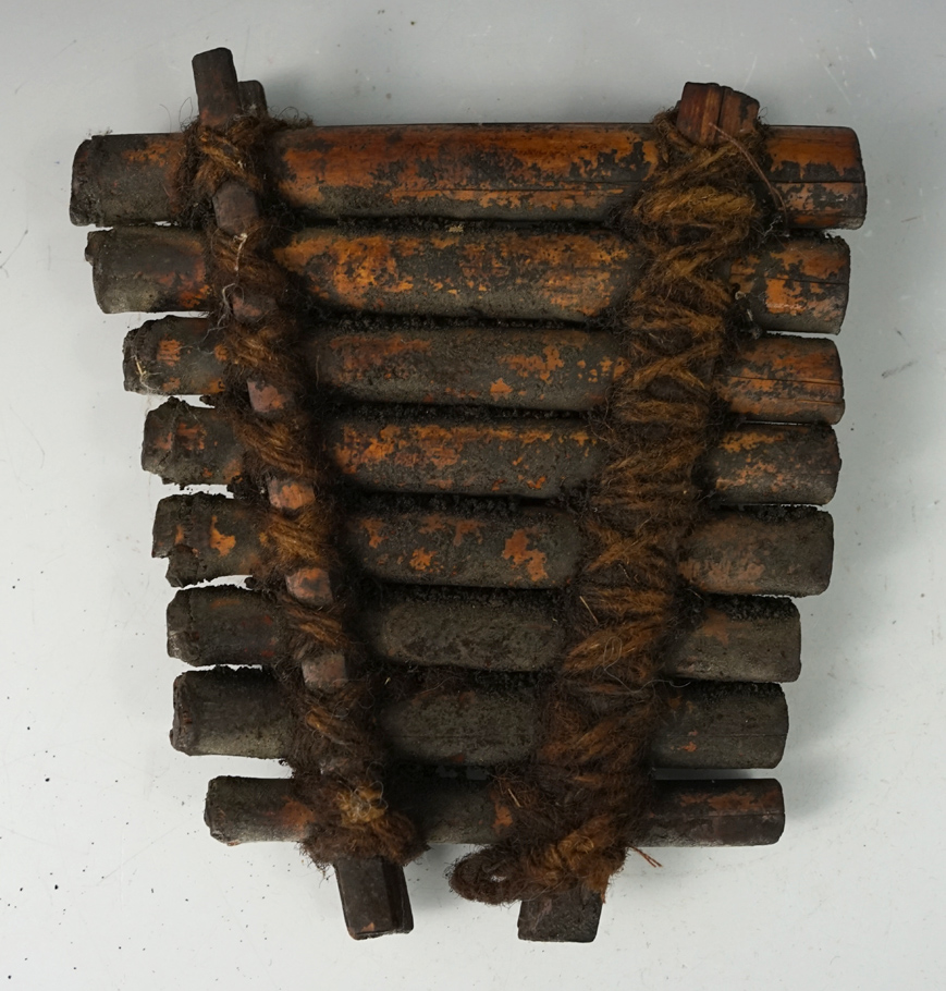 5 1/4" Long Ancient Bone Flute that still retains the original weaving. Found in Peru.