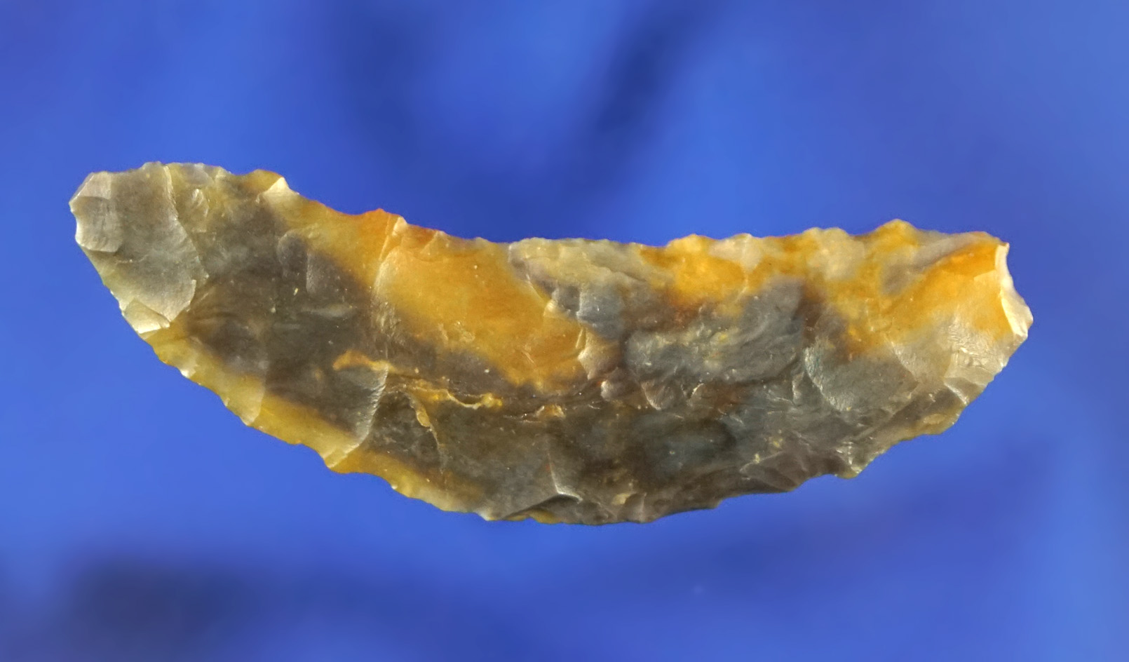 1 3/4" heavily patinated Paleo Crescent found in Oregon.