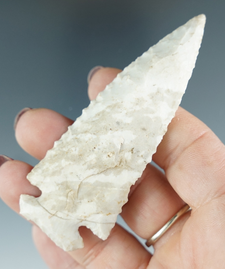 Archaic 3 1/4" cream and tan Dovetail. Found in Illinois.