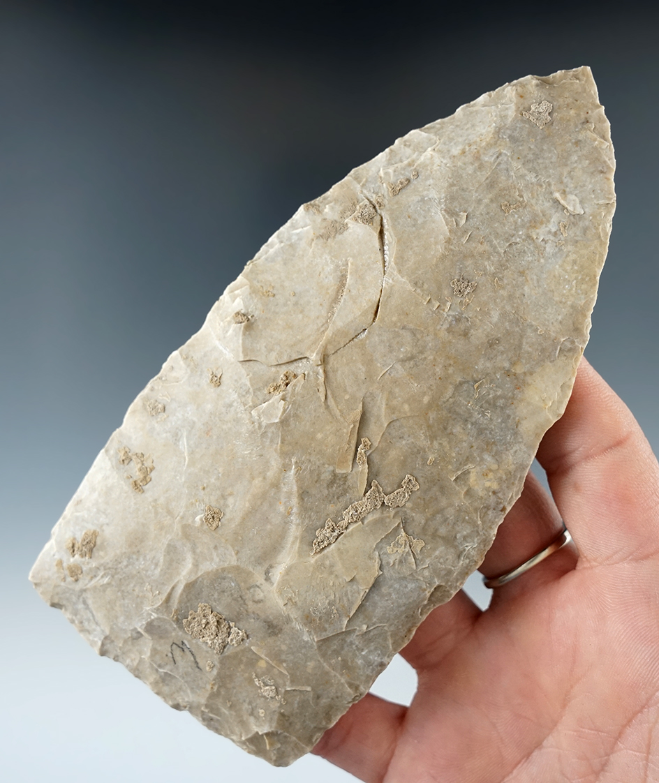 Very large 5 7/16" Flint Blade that is heavily patinated found in Texas.