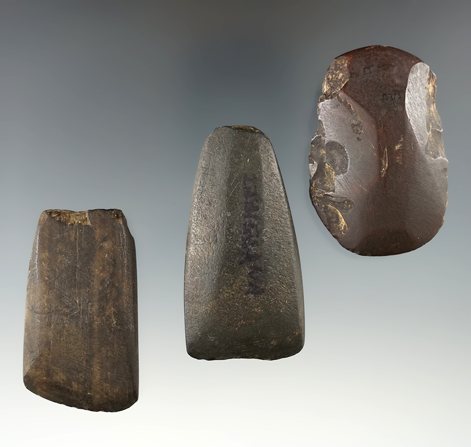 Set of three stone tools including two Adzes and one Hematite Celt, largest is 2 5/16".