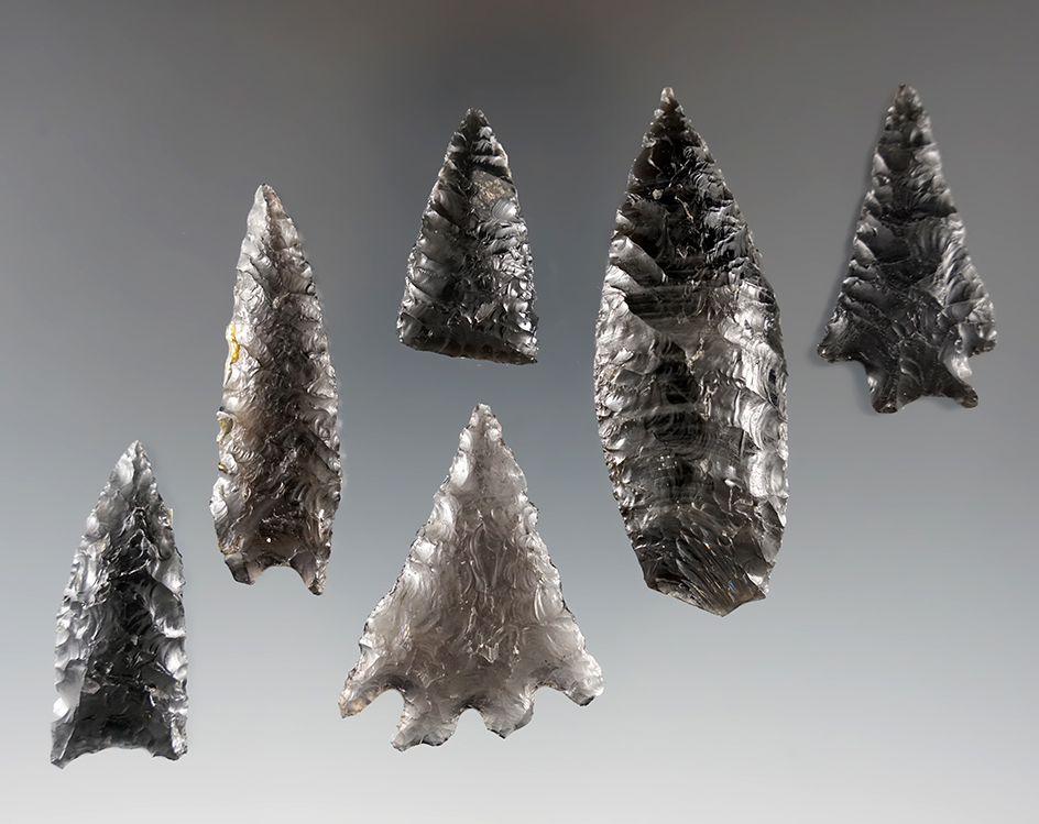 Group of six Great Basin artifacts made from Obsidian, largest is 2 9/16".