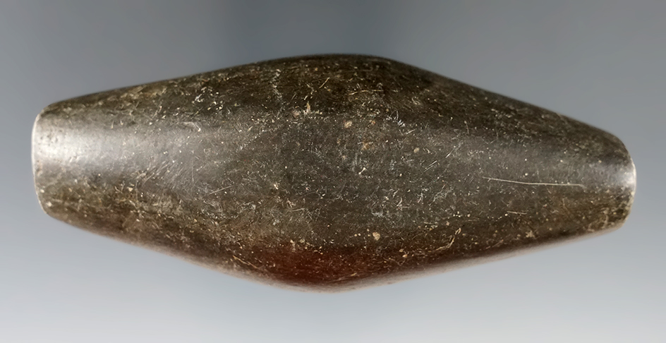 3 7/8" Adena Expanded Center Gorget that is partially drilled. Hematite. Ross Co., Ohio.