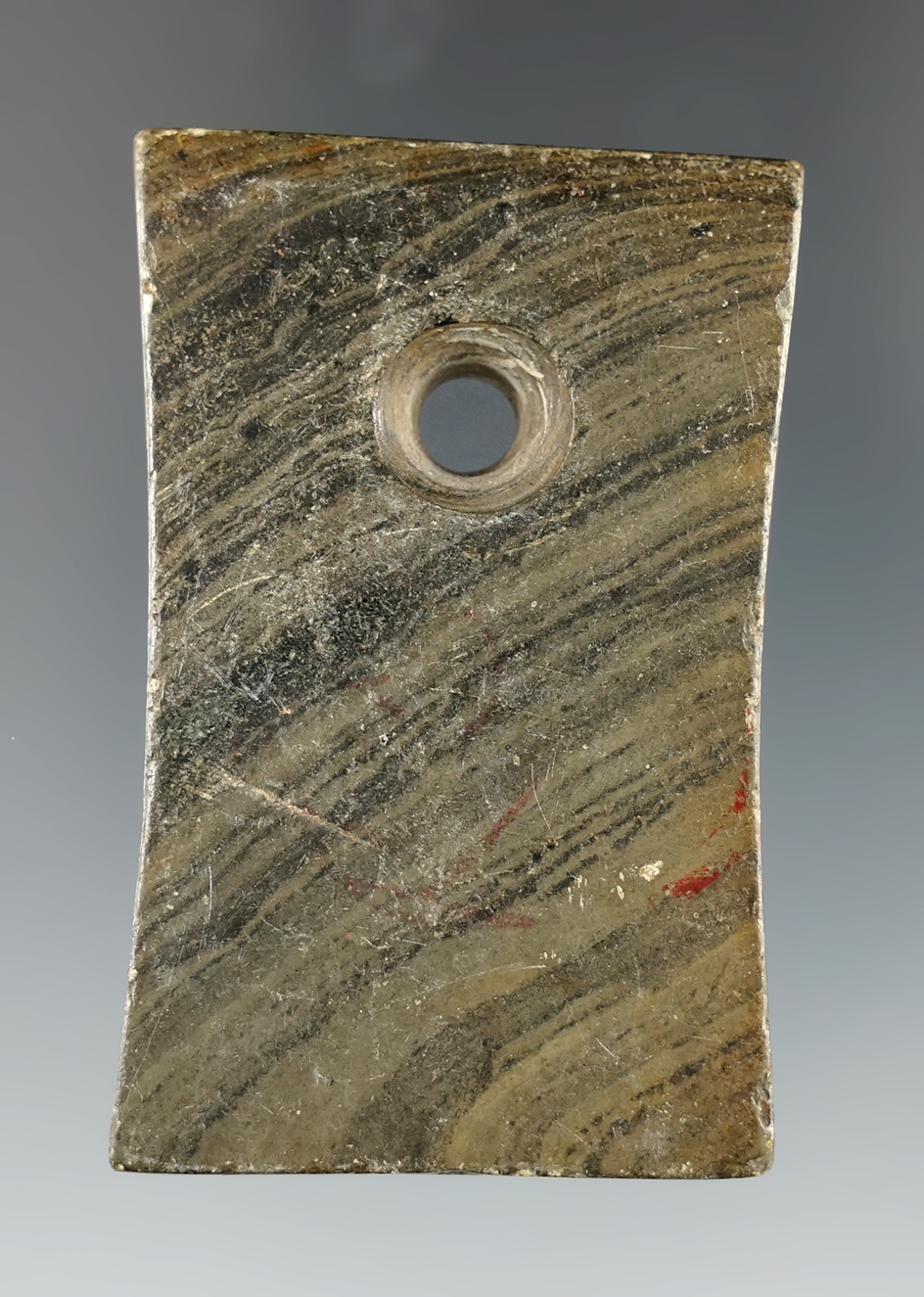 2 3/16" Banded Slate Adena Trapezoidal Pendant. Found in Lucas Co., Ohio. Ex. Cole, Cole, Sisson.