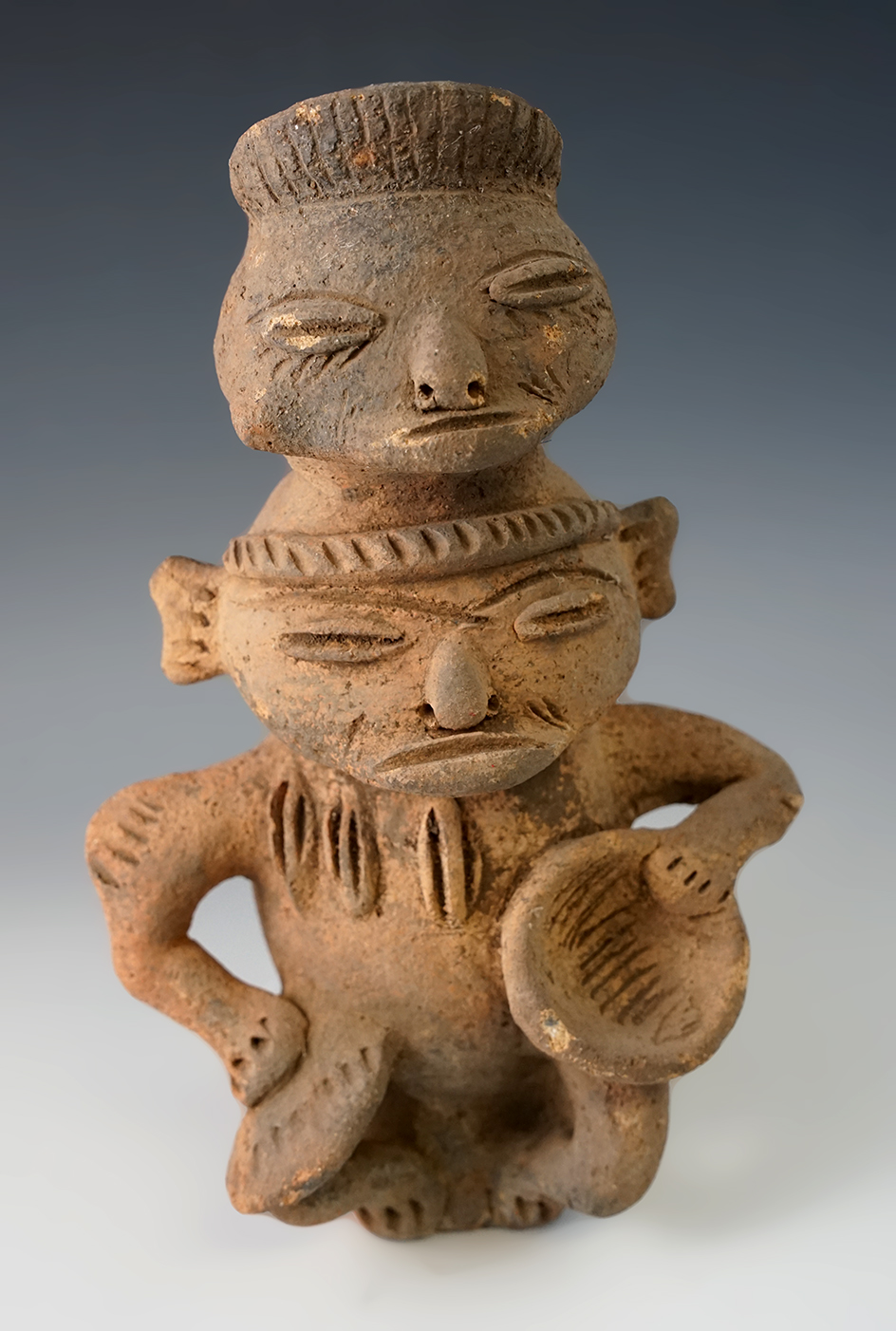 Large 9" Tall Pre-Columbian Pottery Figure from Meso-America in very good condition.