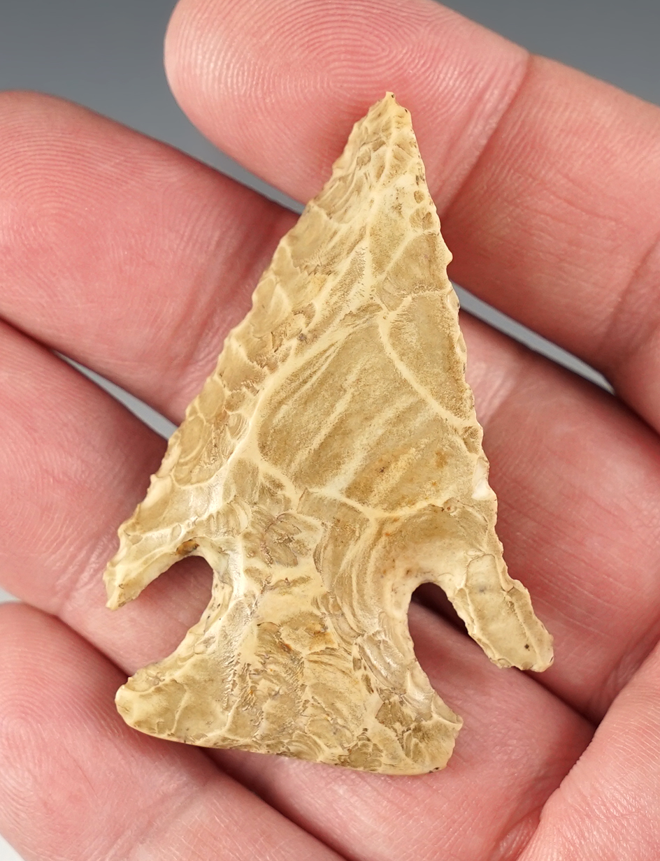 2 1/8" Steeply Beveled Thebes point found in Harrison Co., Ohio. Very heavily patinated.