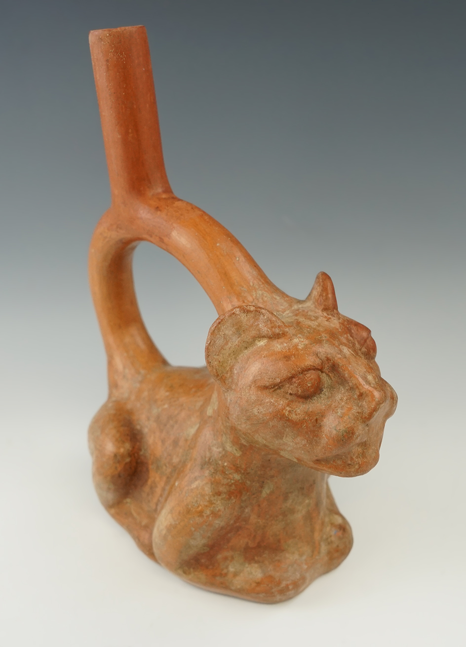 5 1/4" wide x 9" tall Moche stirrup spout vessel featuring a mountain lion. Circa A.D. 800. Peru.