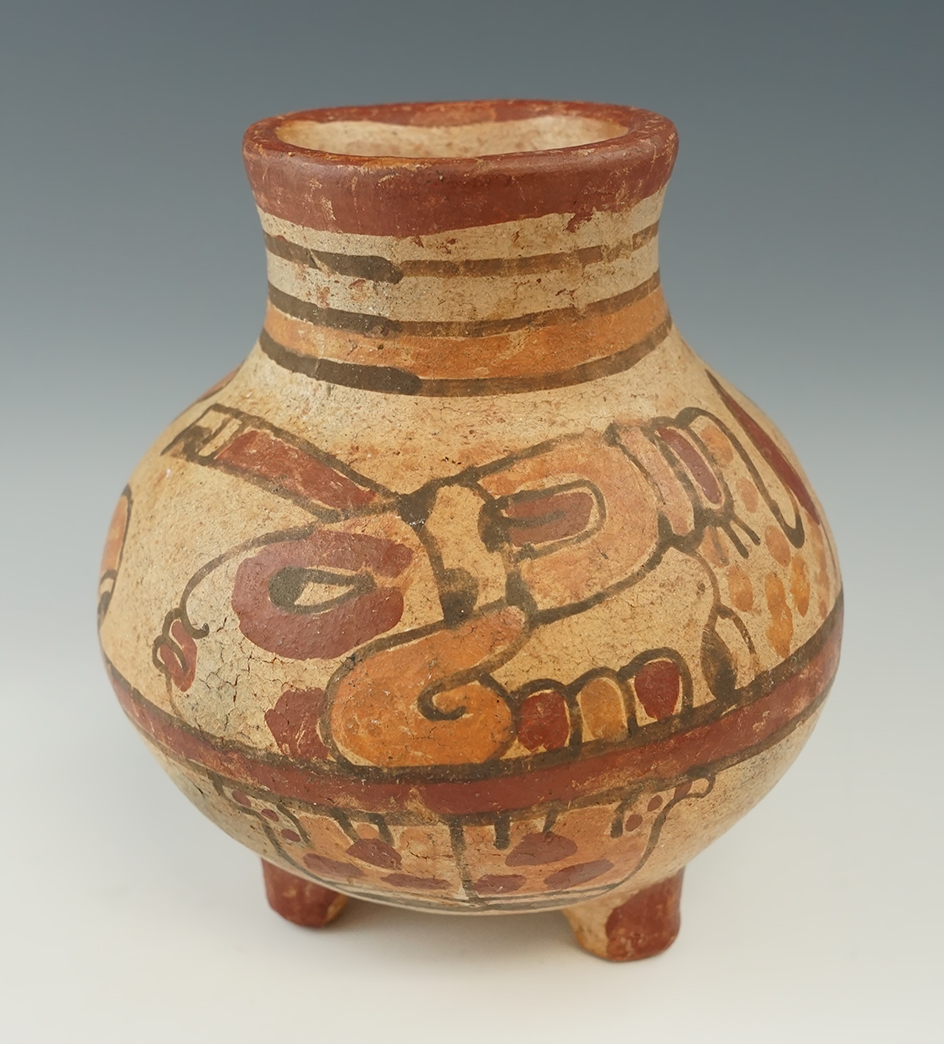 6 1/2" tall x 5 3/4" wide tri-leg Mayan pottery vessel. Recovered in Belize.