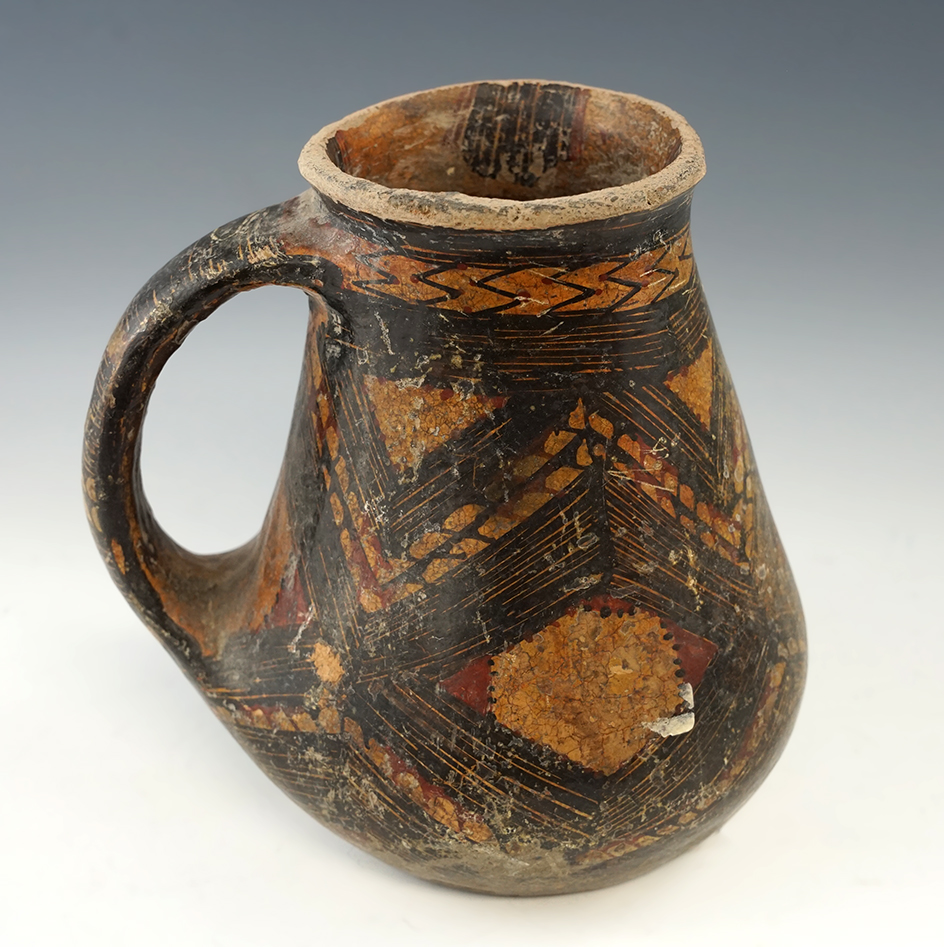 7" tall handled Berber pottery vessel from Morocco.