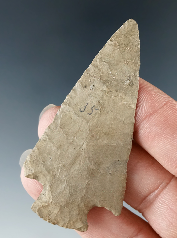 Thin and very nicely flaked 2 9/16" cornernotch found in Kentucky.