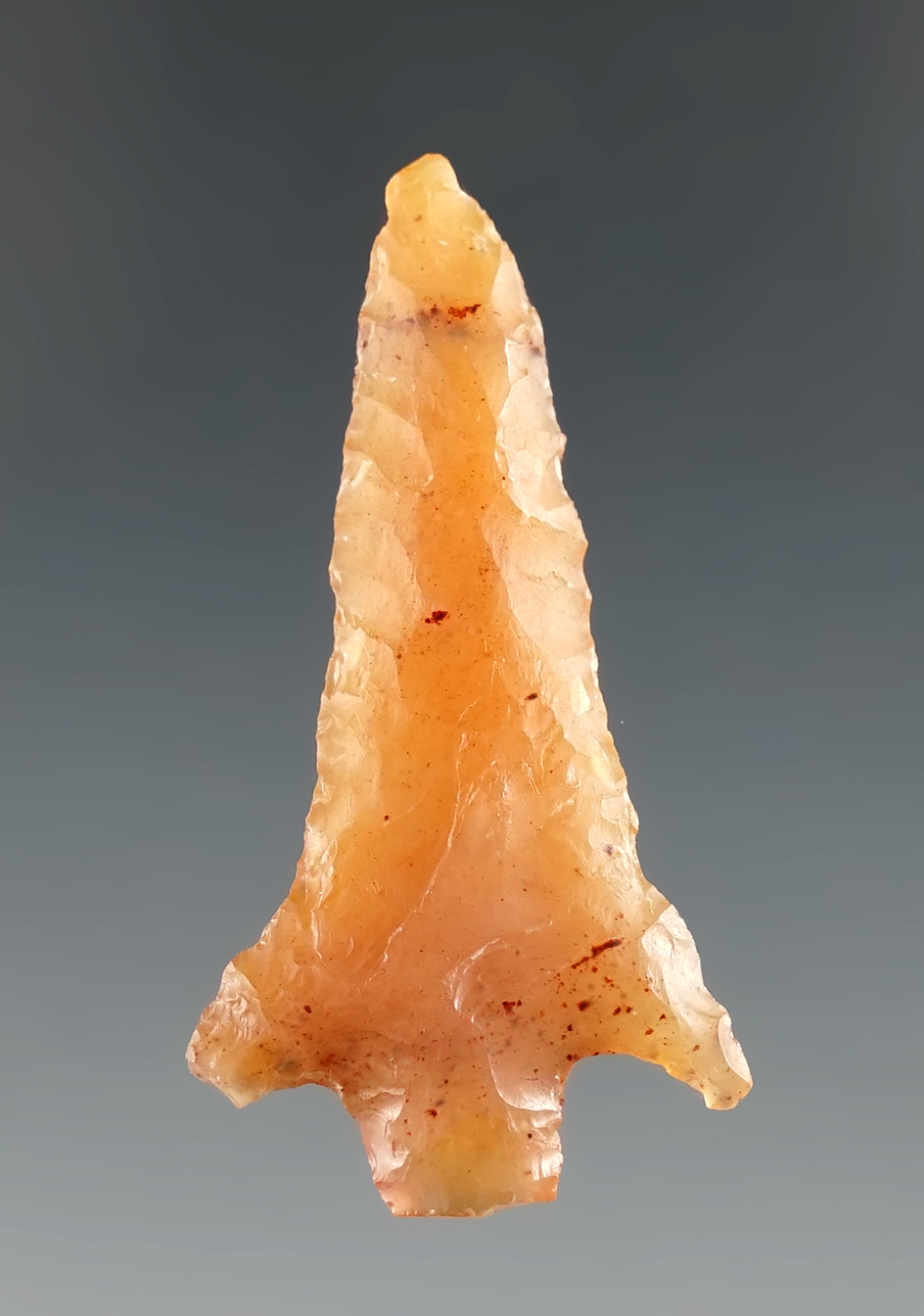 1 1/2" stemmed point made from semi-translucent pink chalcedony found in Klickitat Co., WA.