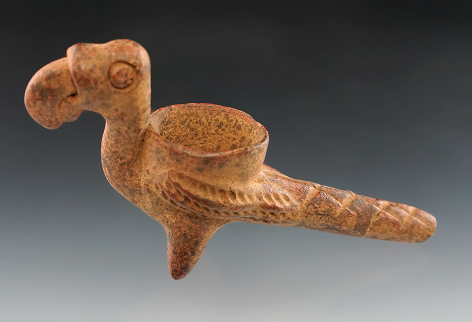 4 5/8" pre-Columbian clay bird effigy pipe. Excellent detail and style, end of stem is broken. COA.