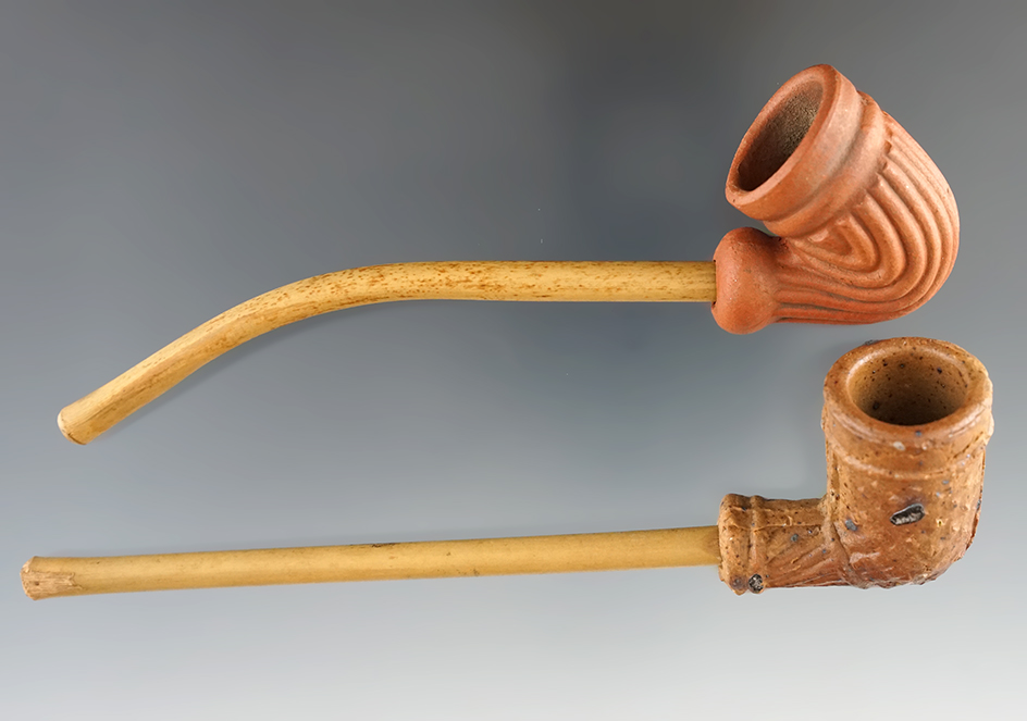 Pair of old clay trade pipe with original stems that make a nice display.