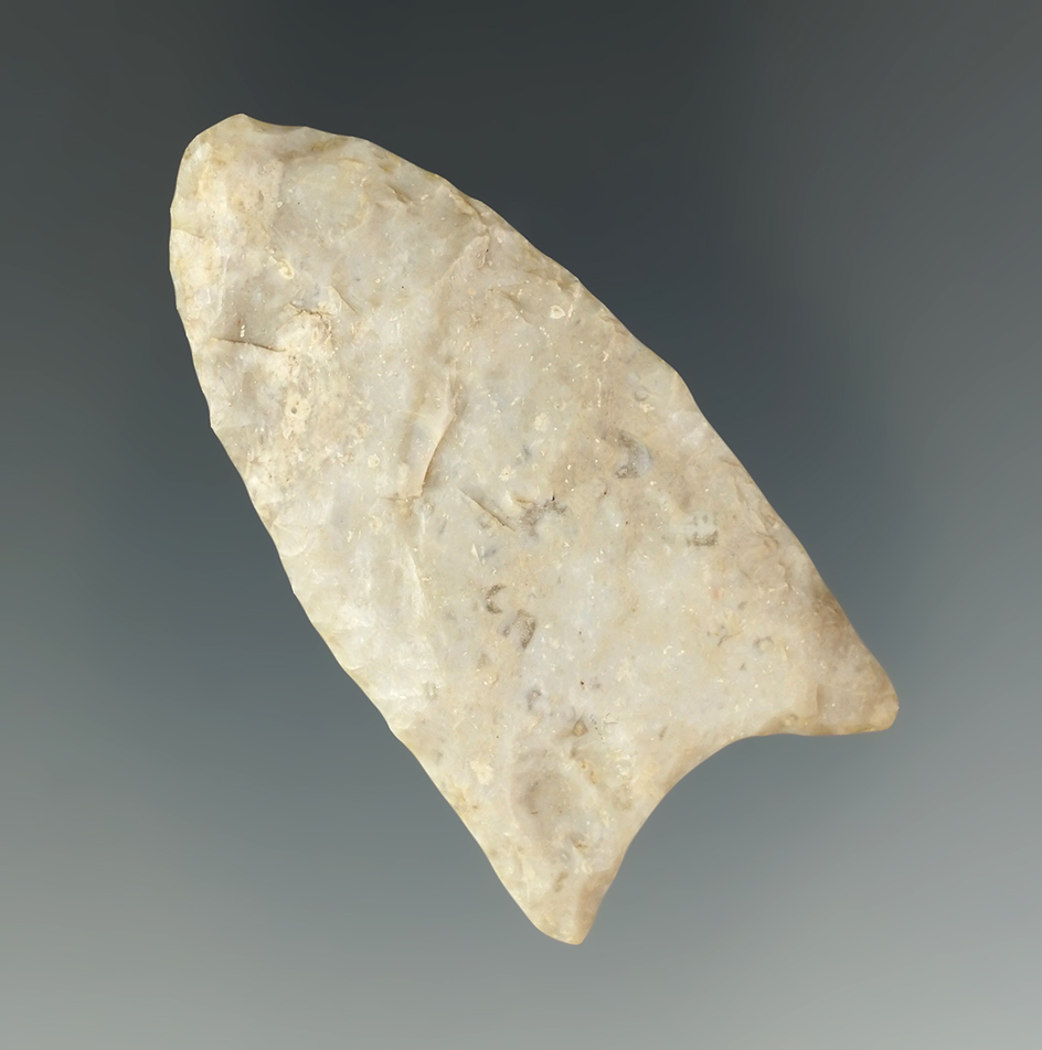 2 1/8" Paleo fluted Clovis with heavily ground base and lower edge, found in Illinois.