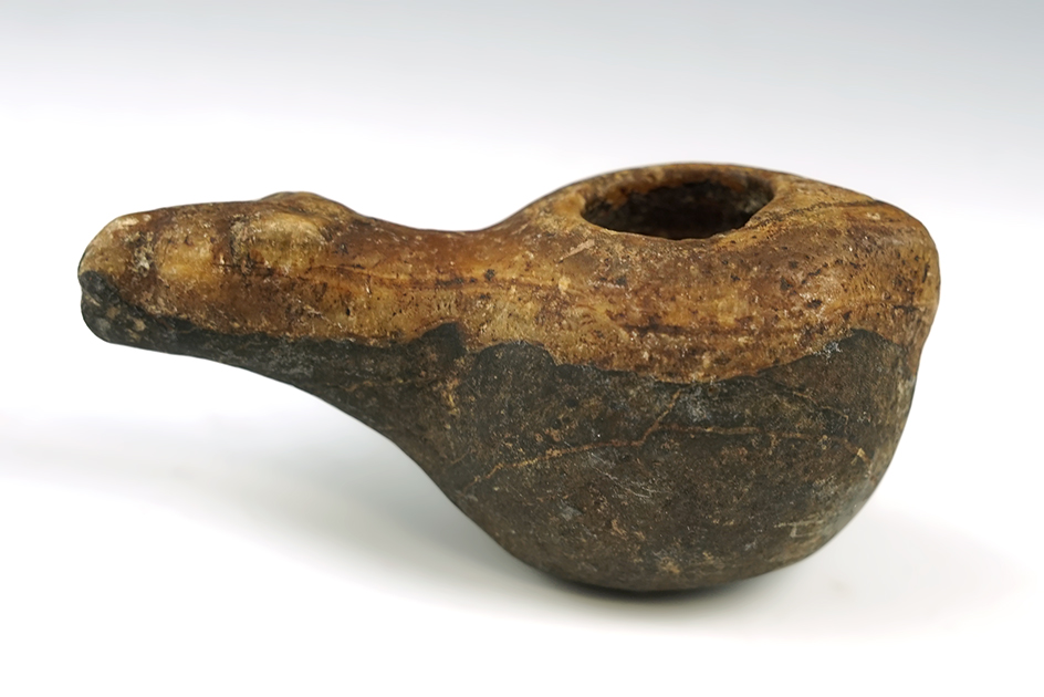 3 1/16" long nicely patinated llama Canopa found in Peru. Attractive two-tone material.