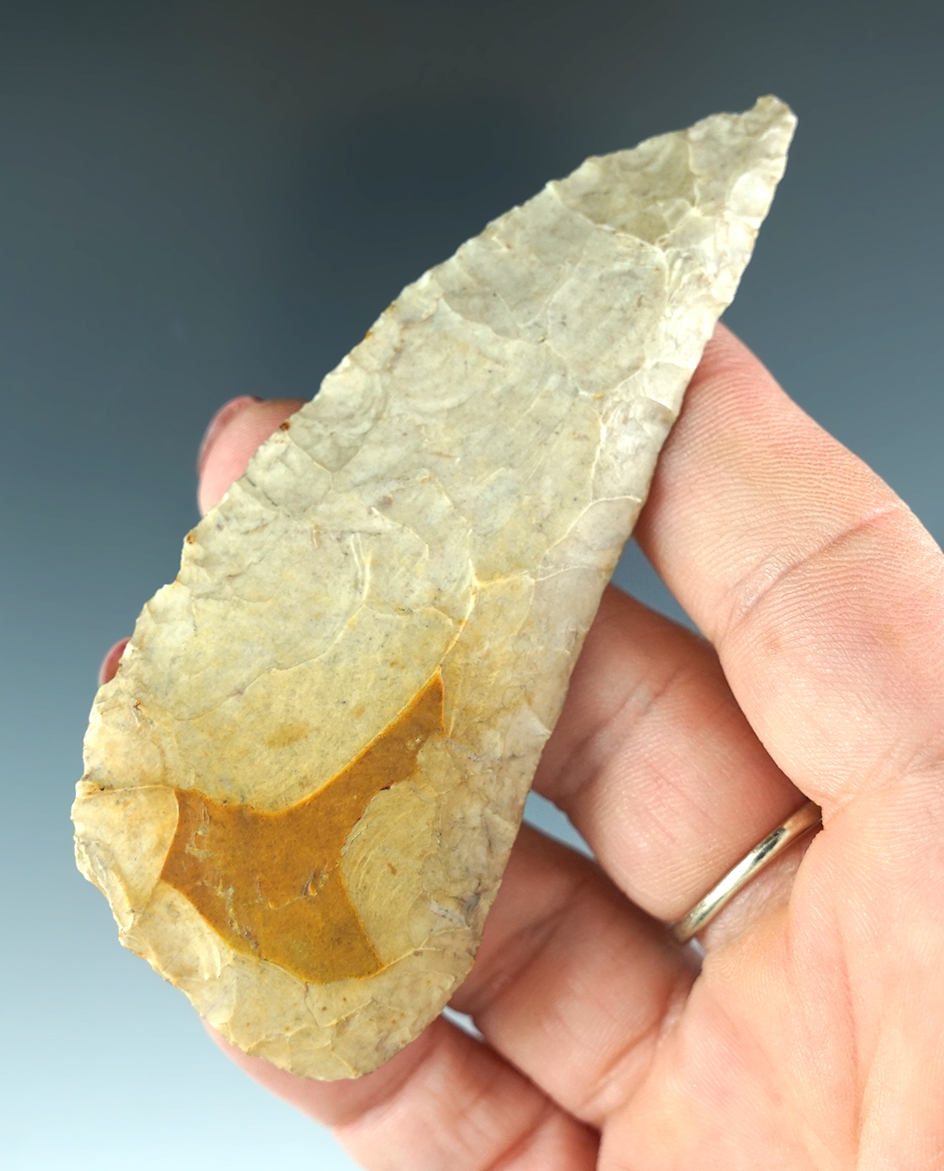 3 1/2" heavily patinated curved Paleo Knife with a nice flute on one side, found in Illinois.