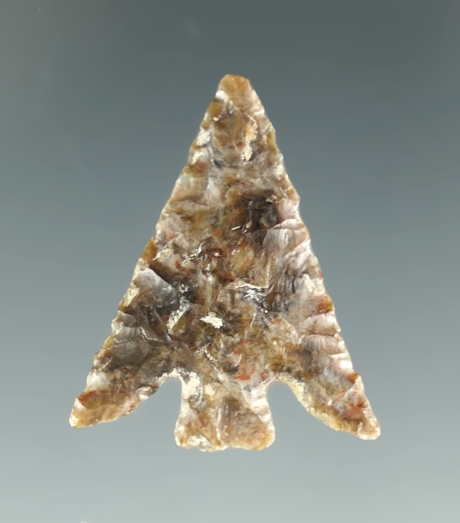 Heavily patinated 1" Columbia Plateau with nice flaking, found near the Columbia River.