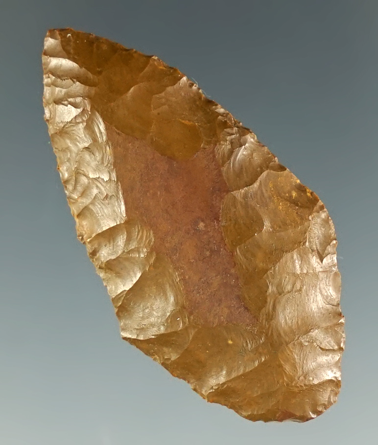 1 11/16" beautifully patinated Jasper dart point found in Washington.