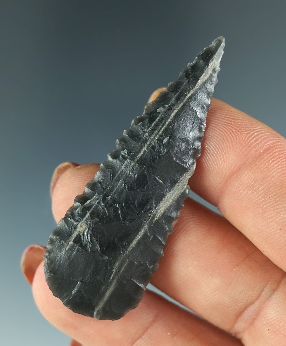 2 1/8" Finely flaked knife with serrated edges found near Priest Rapids, Columbia River.